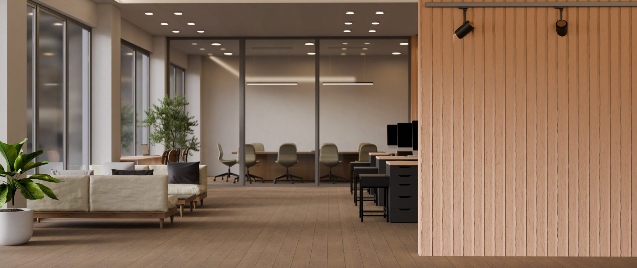 Modern open-plan office space with glass partitions, wooden accents, and collaborative work areas